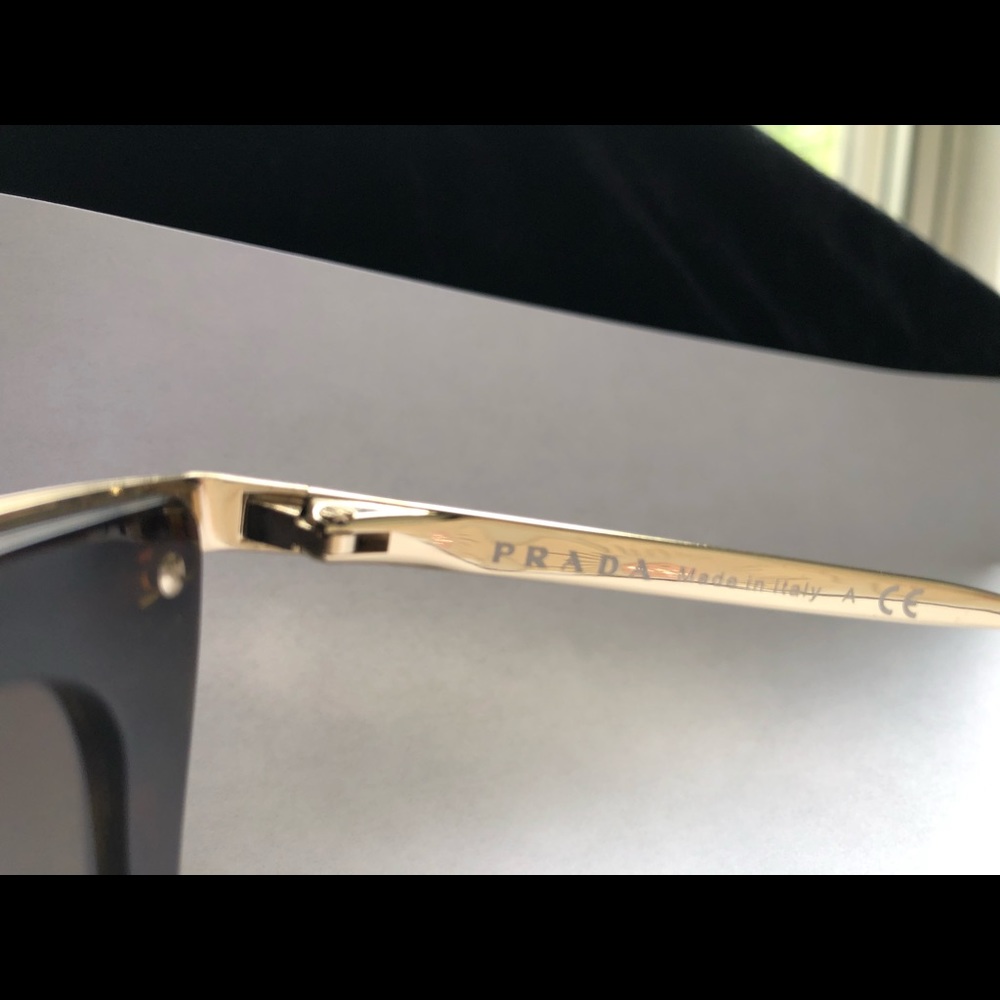 Authentic Prada sunglasses;tortoiseshell trimmed in gold;perfect condition. - Picture 4 of 4